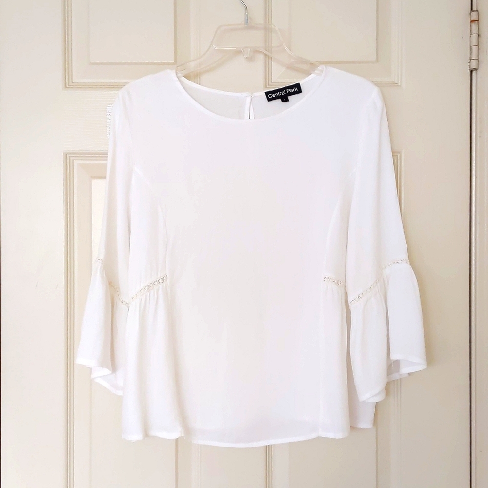 100% Rayon Blouse with wide bottom, sleeves and lace designs.